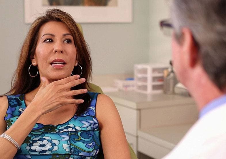 Dr. Gross consulting with a female patient