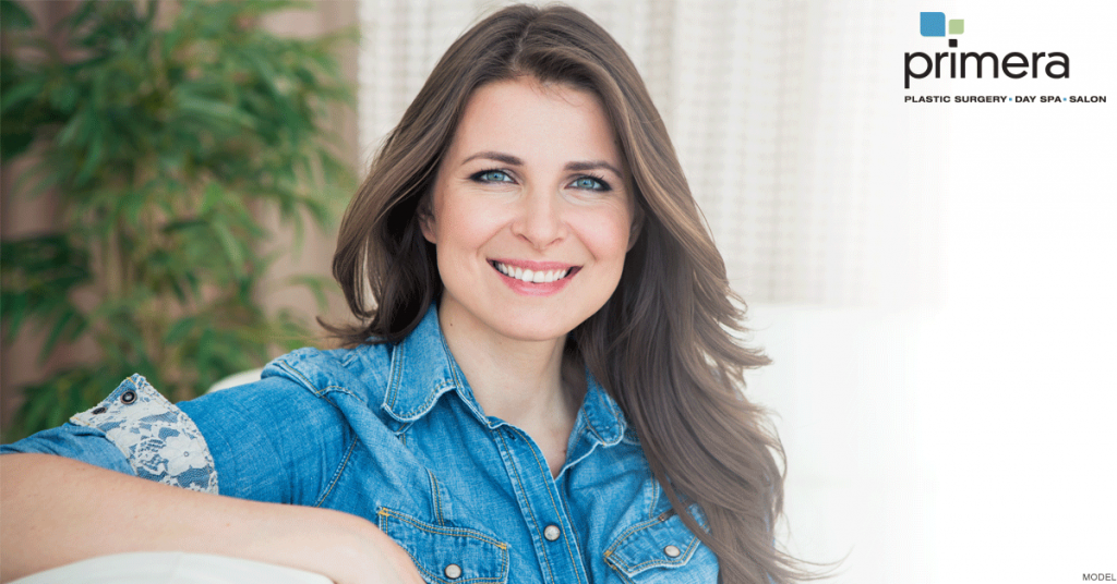 Natural-looking, attractive woman smiling at camera