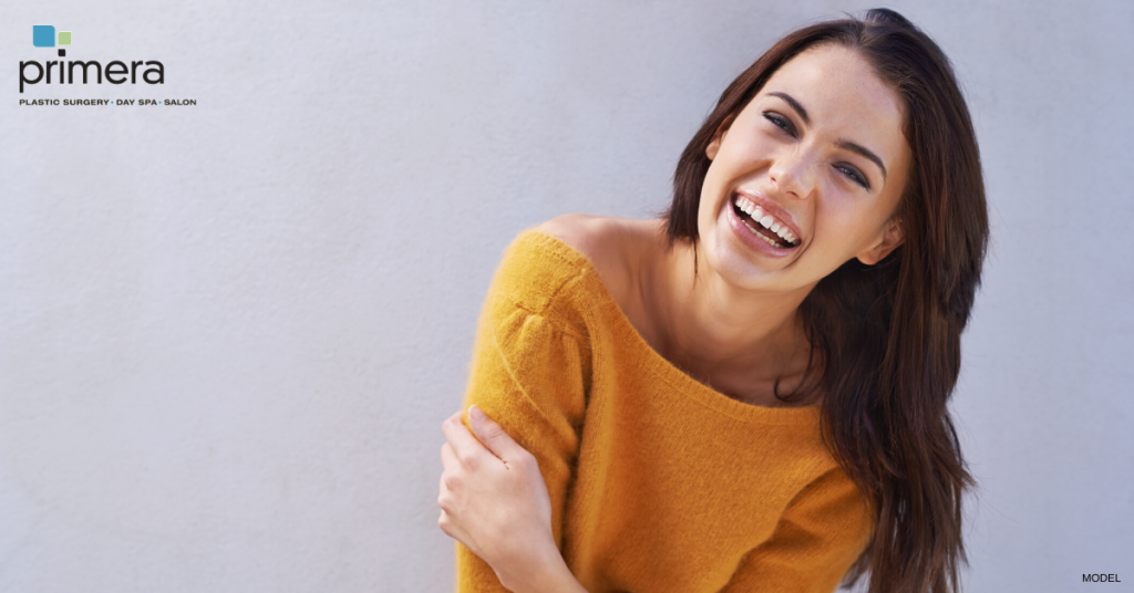 Woman smiling without lines or creases after BOTOX