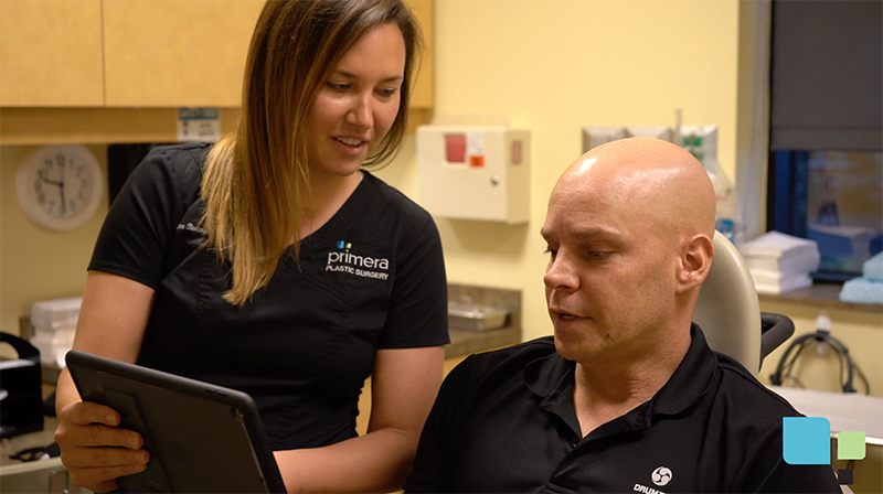 Dr. Gross staff member consulting with actual mole removal patient