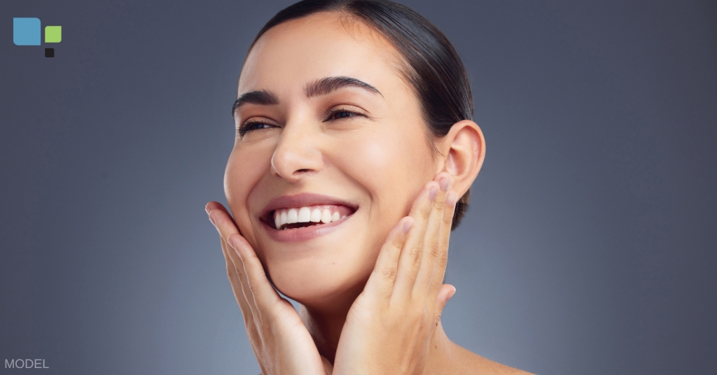 Woman smiling with her BOTOX results (model)