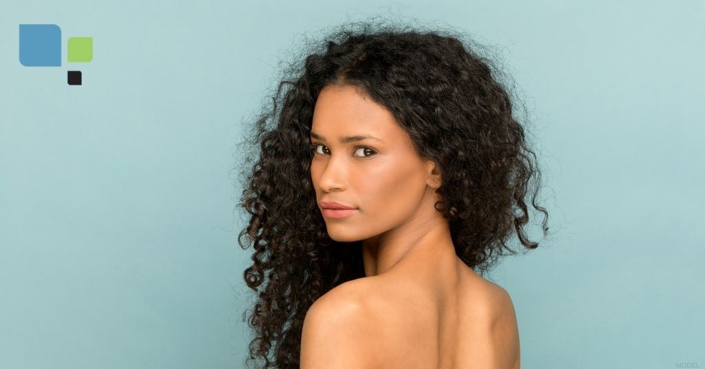 Beautiful woman looking over her shoulder (model)